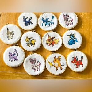 11 Pokémon framed ring cross stitch.